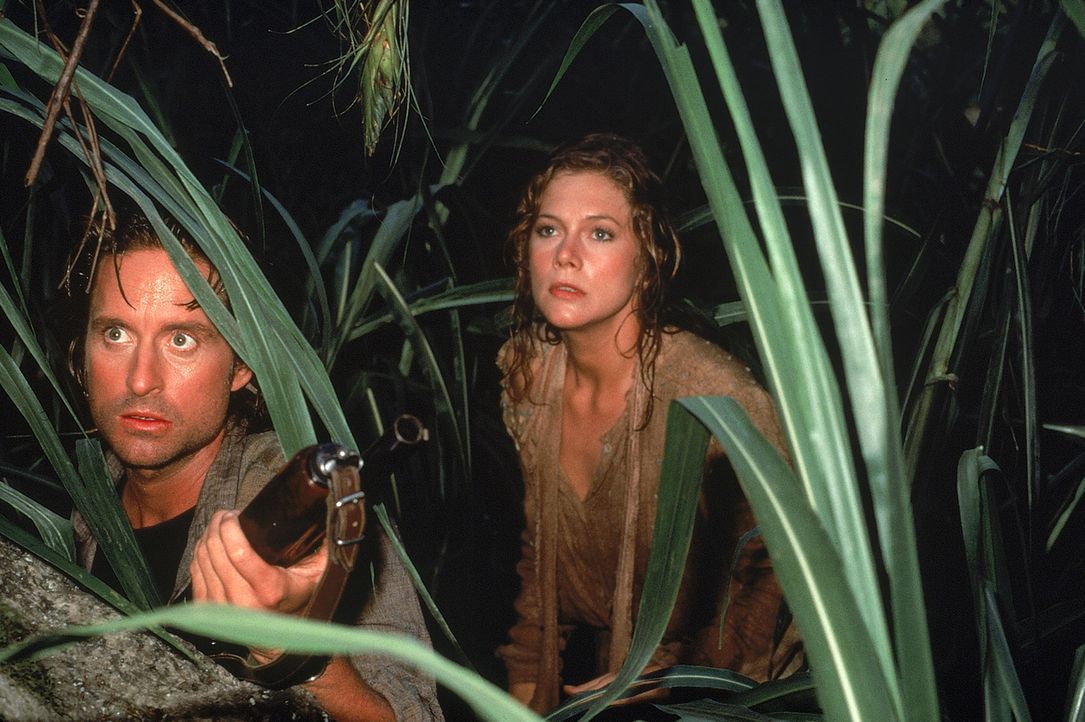 Gemeinsam machen sich Joan (Kathleen Turner, r.) und Jack (Michael Douglas, l.) auf die atemberaubende Jagd nach dem grünen Diamanten ... - Bildquelle: 1984 Twentieth Century Fox Film Corporation.  All rights reserved.
