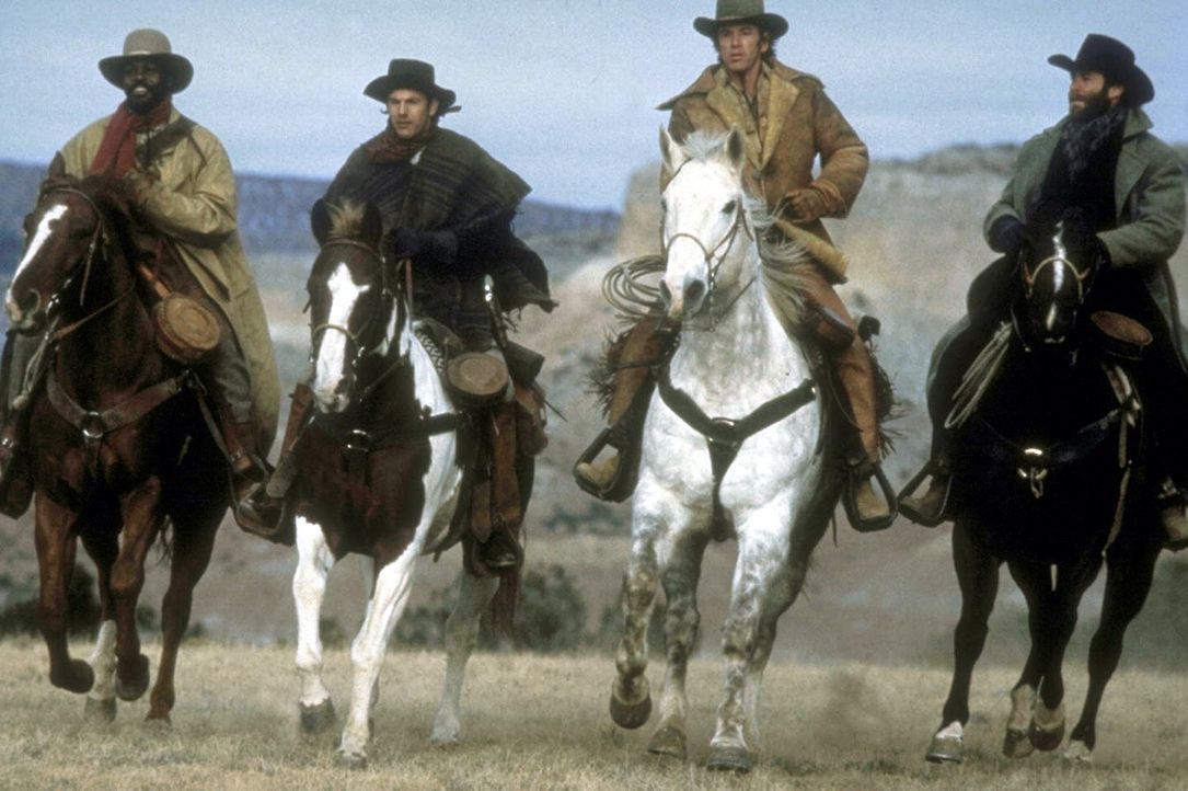 Die 'Glorreichen Vier' auf dem Weg nach Silverado: Jake (Kevin Costner, 2.v.l.), sein älterer Bruder Emmett (Scott Glenn, 2.v.r.), Lebenskünstler... - Bildquelle: Columbia Pictures